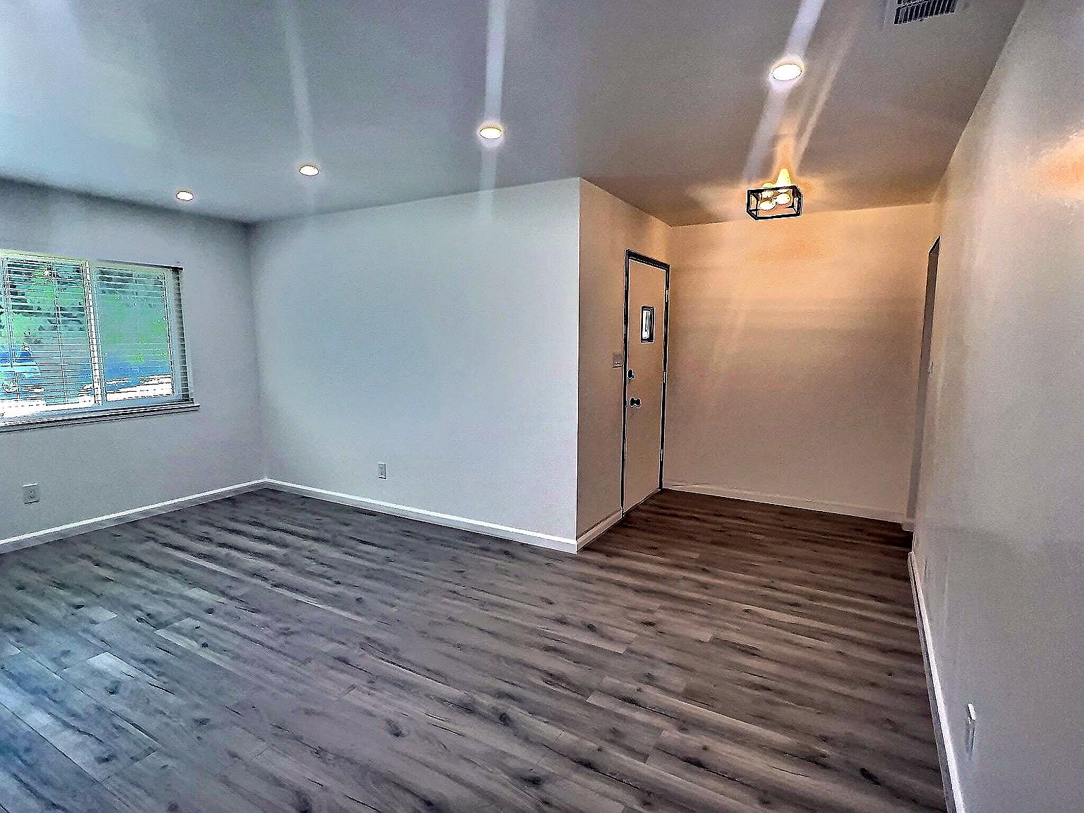 Bright flexible living area near the entry